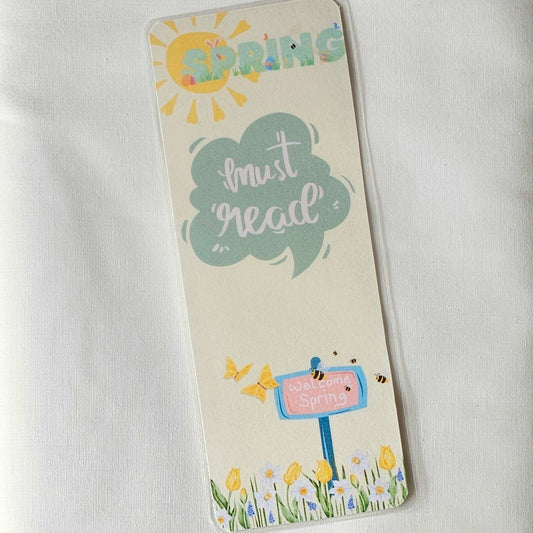 Laminated bookmark - spring must read